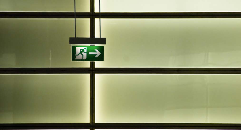 Illuminated emergency exit sign